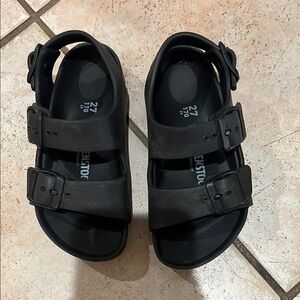Birkenstock Black Sandals with Adjustable Straps and Cushioned Footbed